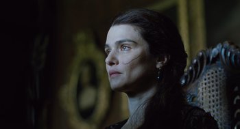 Movie still from “The Favourite” (2018), directed by Yorgos Lanthimos – A person looking to their left; Close Up shot, Low angle