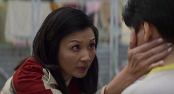 Movie still from “A Million Miles Away” (2023), directed by Alejandra Márquez Abella – A person looking at a person; Close Up shot, Over the shoulder angle
