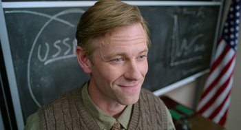 Movie still from “A Million Miles Away” (2023), directed by Alejandra Márquez Abella – A person wearing a sweater; Close Up shot, Over the shoulder angle