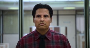Movie still from “A Million Miles Away” (2023), directed by Alejandra Márquez Abella – A person wearing a shirt and a tie; Close Up shot, Low angle