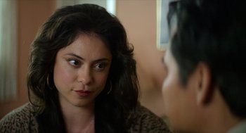 Movie still from “A Million Miles Away” (2023), directed by Alejandra Márquez Abella – A woman looking at her reflection in a mirror; Close Up shot, Over the shoulder angle