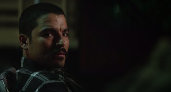 Movie still from “A Million Miles Away” (2023), directed by Alejandra Márquez Abella – A person with a mustache; Close Up shot, Over the shoulder angle
