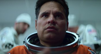 Movie still from “A Million Miles Away” (2023), directed by Alejandra Márquez Abella – A person wearing an astronaut helmet; Close Up shot, Low angle