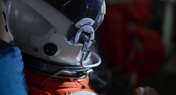 Movie still from “A Million Miles Away” (2023), directed by Alejandra Márquez Abella – A helmet with a strap attached to it; Close Up shot, Low angle