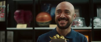 A man holding a gift box in his hands