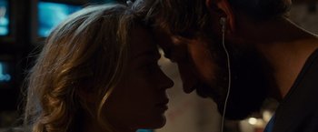 Movie still from “A Quiet Place” (2018), directed by John Krasinski – A man and a woman face to face in the dark; Close Up shot, Over the shoulder angle