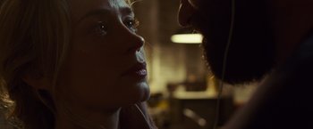 Movie still from “A Quiet Place” (2018), directed by John Krasinski – A woman and a man's face; Close Up shot, Low angle