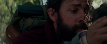 Movie still from “A Quiet Place” (2018), directed by John Krasinski – A person with a beard; Close Up shot, Over the shoulder angle