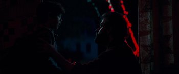 Movie still from “A Quiet Place” (2018), directed by John Krasinski – A man with a beard is talking to another man; Close Up shot, Over the shoulder angle