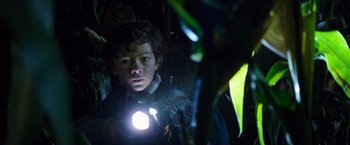 Movie still from “A Quiet Place” (2018), directed by John Krasinski – A boy with a light in his mouth; Close Up shot, Low angle