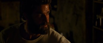 Movie still from “A Quiet Place” (2018), directed by John Krasinski – A person with a beard; Close Up shot, Over the shoulder angle