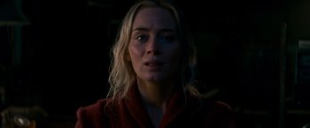Movie still from “A Quiet Place” (2018), directed by John Krasinski – A person with long blonde hair; Close Up shot, Low angle