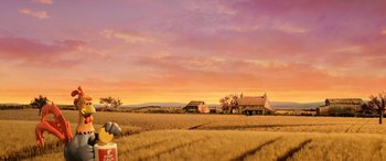 Movie still from “A Shaun the Sheep Movie: Farmageddon” (2019), directed by Will Becher – An image of an open field at sunset; Extreme Wide shot, Low angle