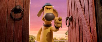 Movie still from “A Shaun the Sheep Movie: Farmageddon” (2019), directed by Will Becher – A toy dog near a door; Close Up shot, Over the shoulder angle
