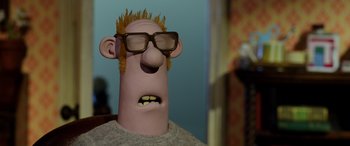 Movie still from “A Shaun the Sheep Movie: Farmageddon” (2019), directed by Will Becher – The head of a cartoon character; Close Up shot, Low angle