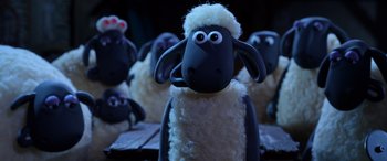 Movie still from “A Shaun the Sheep Movie: Farmageddon” (2019), directed by Will Becher – A group of sheep are standing in a row; Close Up shot, High angle