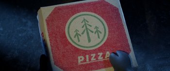 Movie still from “A Shaun the Sheep Movie: Farmageddon” (2019), directed by Will Becher – A red and green sign for a pizza restaurant; Extreme Close Up shot, Overhead angle