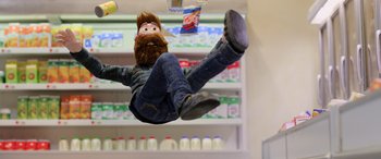 Movie still from “A Shaun the Sheep Movie: Farmageddon” (2019), directed by Will Becher – A man with a long beard is flying through the air; Wide shot, Low angle