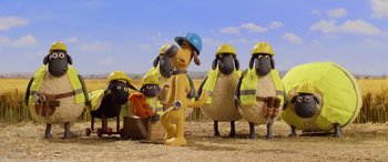 Movie still from “A Shaun the Sheep Movie: Farmageddon” (2019), directed by Will Becher – A group of sheep wearing hard hats and safety vests; Wide shot, Low angle