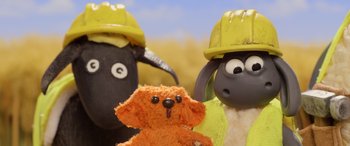 Movie still from “A Shaun the Sheep Movie: Farmageddon” (2019), directed by Will Becher – A couple of stuffed animals that are next to each other; Medium shot, High angle