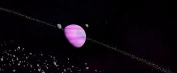 Movie still from “A Shaun the Sheep Movie: Farmageddon” (2019), directed by Will Becher – An image of a purple planet in the sky; Extreme Wide shot, Overhead angle
