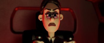 Movie still from “A Shaun the Sheep Movie: Farmageddon” (2019), directed by Will Becher – A cartoon of a man in a suit and tie; Close Up shot, Low angle