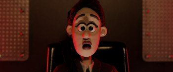 Movie still from “A Shaun the Sheep Movie: Farmageddon” (2019), directed by Will Becher – A cartoon of a man with a surprised look on his face; Close Up shot, Over the shoulder angle