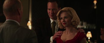 Movie still from “The Founder” (2016), directed by John Lee Hancock – A man and a woman are posing for a picture; Close Up shot, Over the shoulder angle