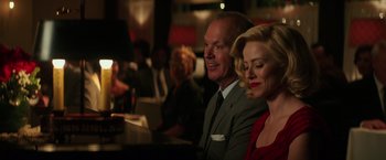 Movie still from “The Founder” (2016), directed by John Lee Hancock – A man and a woman sitting at a table in a restaurant; Close Up shot, Over the shoulder angle