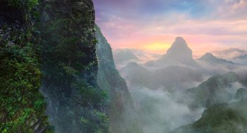 Movie still from “A Writer's Odyssey” (2021), directed by Yang Lu – A view of a mountain range from a distance; Extreme Wide shot, Low angle