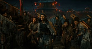 Movie still from “A Writer's Odyssey” (2021), directed by Yang Lu – A group of men in traditional chinese clothing; Wide shot, High angle