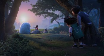 Movie still from “Abominable” (2019), directed by Todd Wilderman – A group of children playing baseball in a field; Extreme Wide shot, Low angle