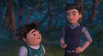 Movie still from “Abominable” (2019), directed by Todd Wilderman – Two animated characters standing next to each other in a forest; Medium shot, Over the shoulder angle