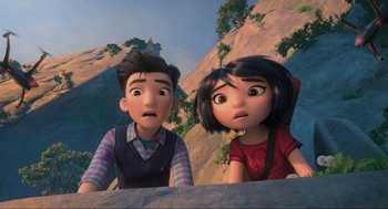 Movie still from “Abominable” (2019), directed by Todd Wilderman – A couple of people standing next to each other on top of a hill; Medium shot, High angle