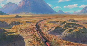 Movie still from “Abominable” (2019), directed by Todd Wilderman – A train traveling down tracks through a field; Extreme Wide shot, High angle