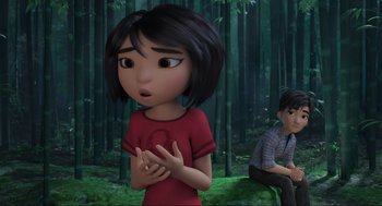 Movie still from “Abominable” (2019), directed by Todd Wilderman – A girl and a boy are sitting in the woods; Medium shot, Over the shoulder angle