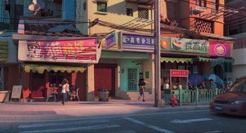 Movie still from “Abominable” (2019), directed by Todd Wilderman – People walking down the street in a chinese city; Extreme Wide shot, High angle