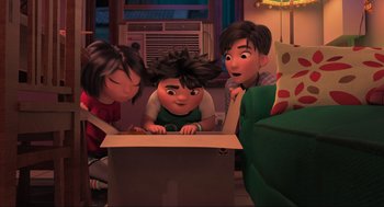 Movie still from “Abominable” (2019), directed by Todd Wilderman – A group of people standing around a box; Medium shot, High angle