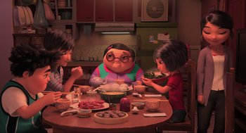 Movie still from “Abominable” (2019), directed by Todd Wilderman – Three children sitting at a table with a bowl of food; Wide shot, High angle