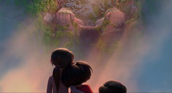 Movie still from “Abominable” (2019), directed by Todd Wilderman – Two children looking at a waterfall in a forest; Extreme Wide shot, Low angle