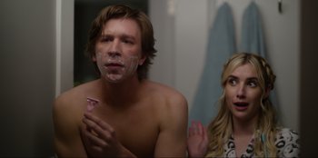 Movie still from “About Fate” (2022), directed by Marius Vaysberg – A man and a woman in a bathroom with shaving cream on their faces; Close Up shot, Over the shoulder angle