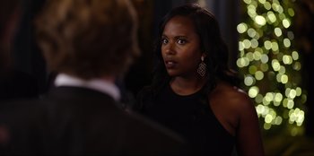 Movie still from “About Fate” (2022), directed by Marius Vaysberg – A woman in a black dress talking to a man; Close Up shot, Over the shoulder angle