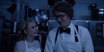 Movie still from “About Fate” (2022), directed by Marius Vaysberg – A man and a woman standing next to each other; Medium shot, Over the shoulder angle