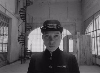 Movie still from “The French Dispatch” (2021), directed by Wes Anderson – Close Up shot, Low angle