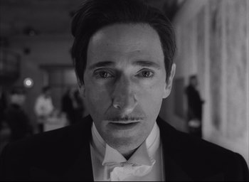 Movie still from “The French Dispatch” (2021), directed by Wes Anderson – Close Up shot, Low angle