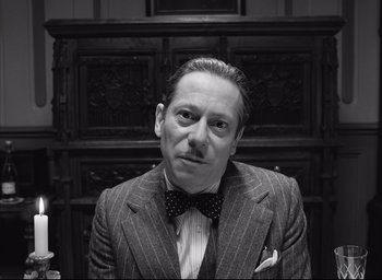 Movie still from “The French Dispatch” (2021), directed by Wes Anderson – Close Up shot, Low angle