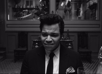 Movie still from “The French Dispatch” (2021), directed by Wes Anderson – Close Up shot, Over the shoulder angle