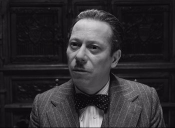 Movie still from “The French Dispatch” (2021), directed by Wes Anderson – Close Up shot, Low angle