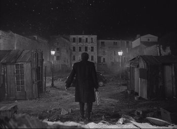 Movie still from “The French Dispatch” (2021), directed by Wes Anderson – Wide shot, Low angle