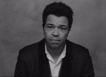 Movie still from “The French Dispatch” (2021), directed by Wes Anderson – Close Up shot, Overhead angle